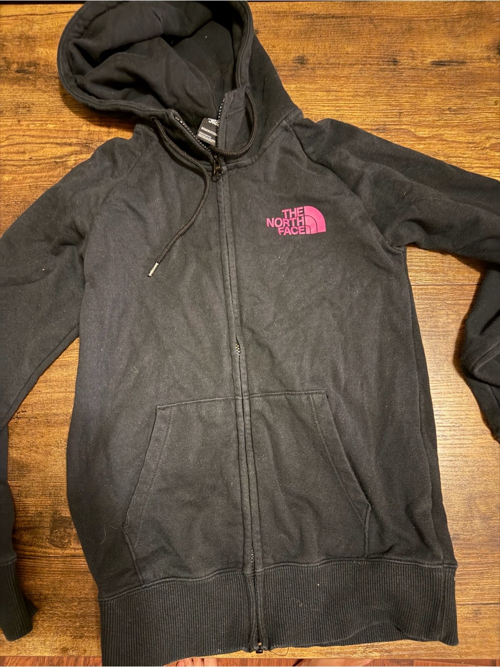 The North Face Black Zip-Up Hoodie with Pink Logo